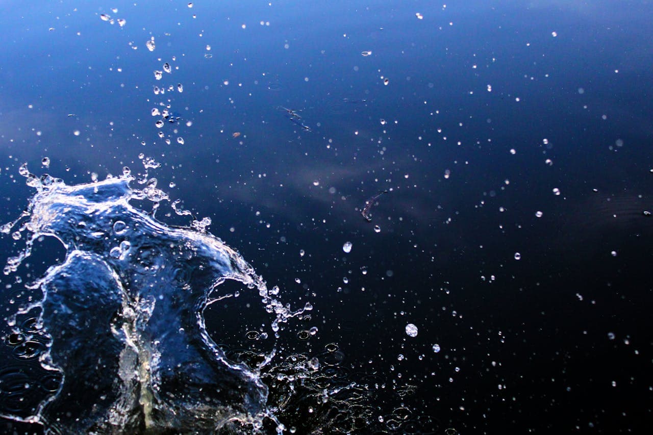 Freshwater splashing on a dark inland waterway