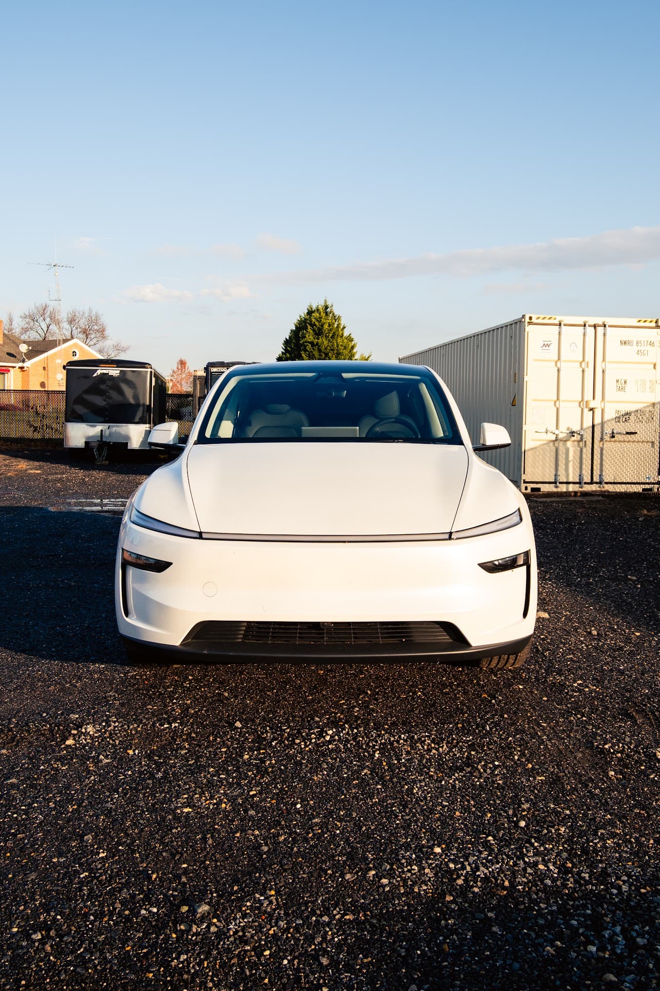 White Tesla front end after paint correction and coating at Dynamite Details